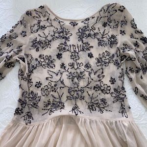 Long sleeve embroidered blouse.